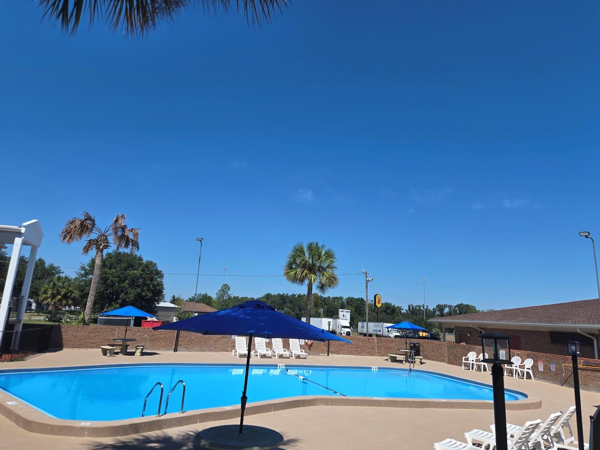 Outdoor pool, open 9:00 AM to 10:00 PM, sun loungers
