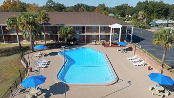 Outdoor pool, open 9:00 AM to 10:00 PM, pool loungers