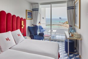 Double Room, Sea View (2 Adults) | Minibar, in-room safe, individually decorated, individually furnished