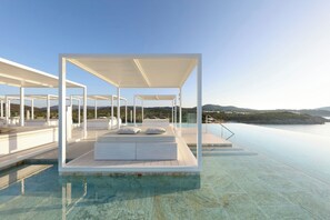 2 outdoor pools, pool umbrellas, sun loungers