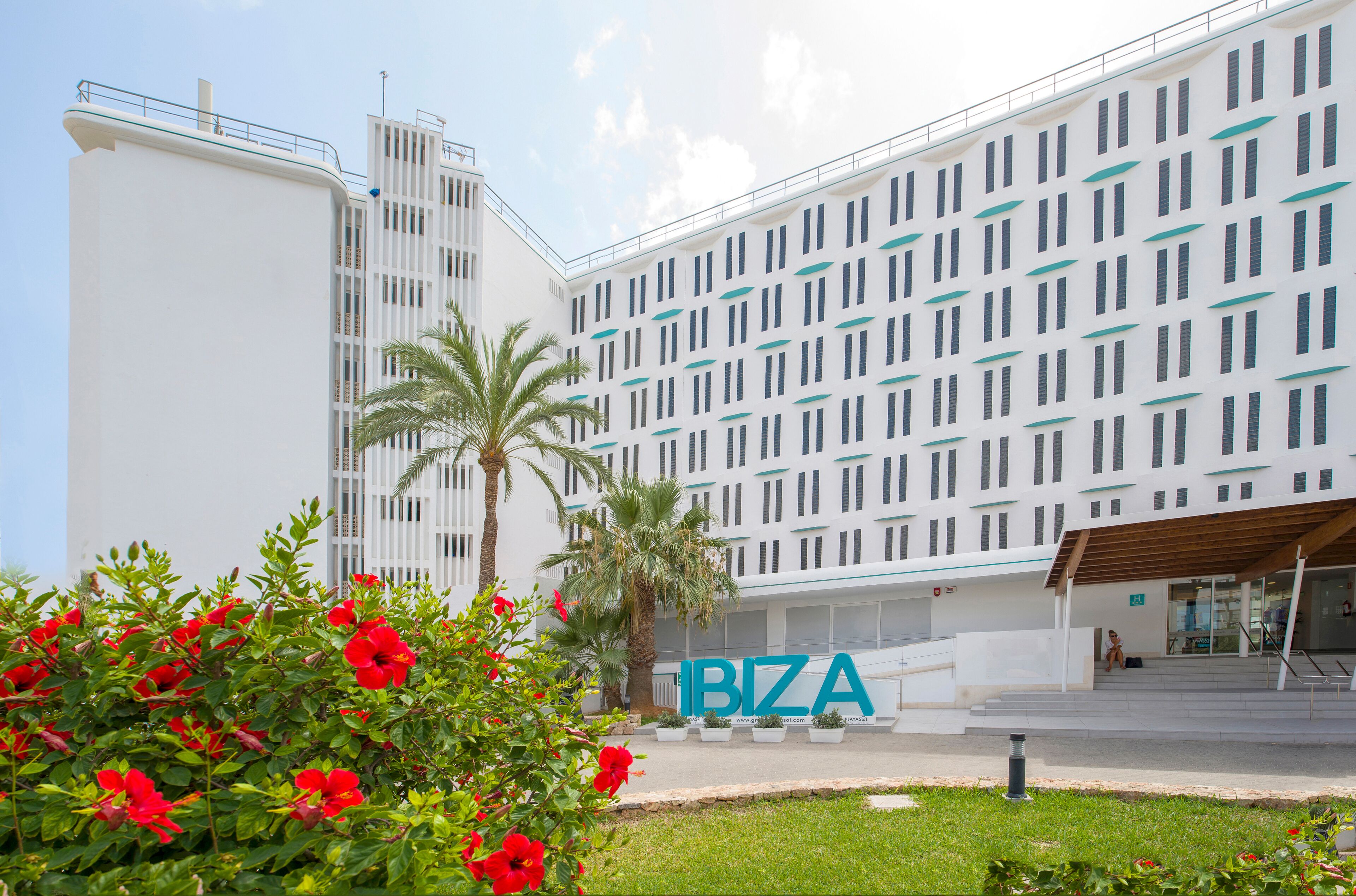 A modern building with a sign reading "BIZA" in front.