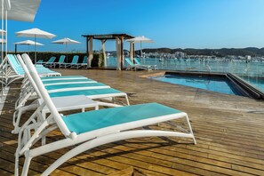 Outdoor pool, pool umbrellas, pool loungers