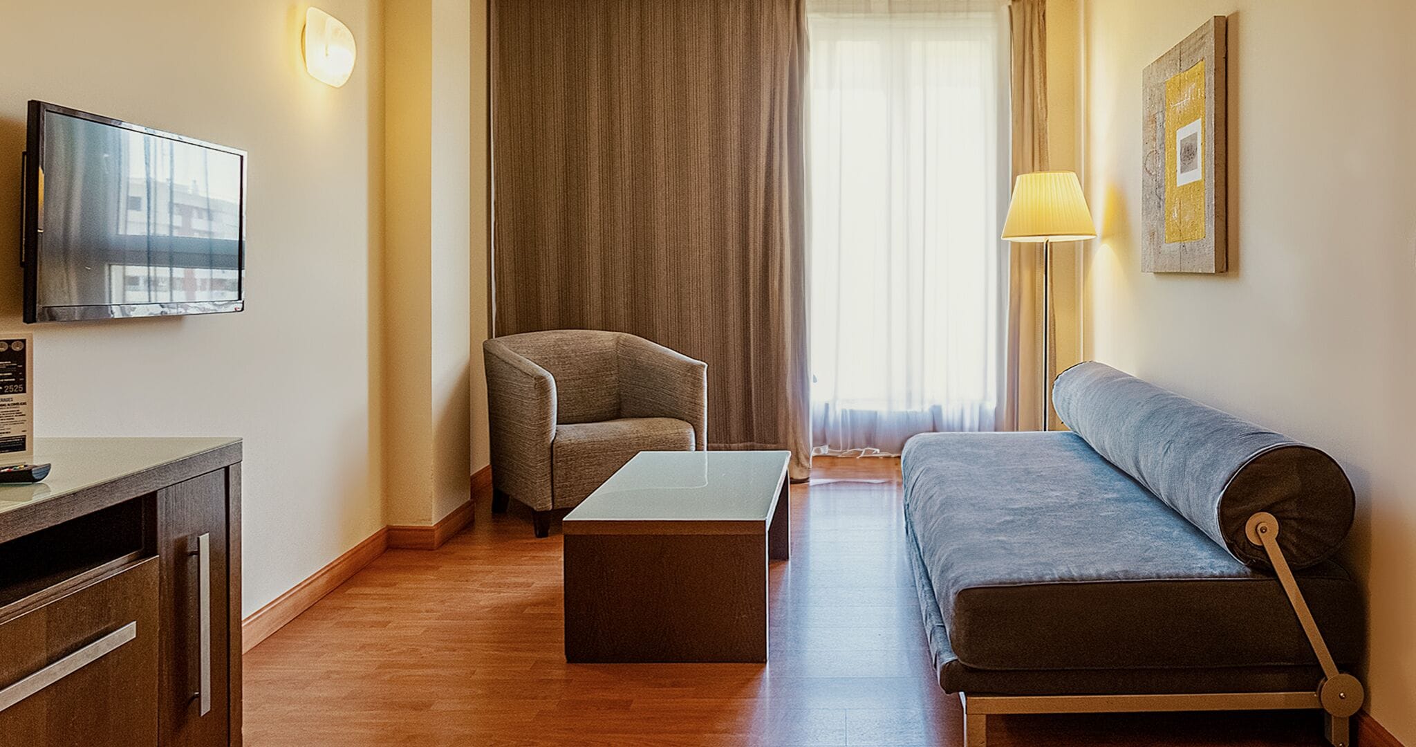 junior suite | minibar, in-room safe, desk, iron/ironing board