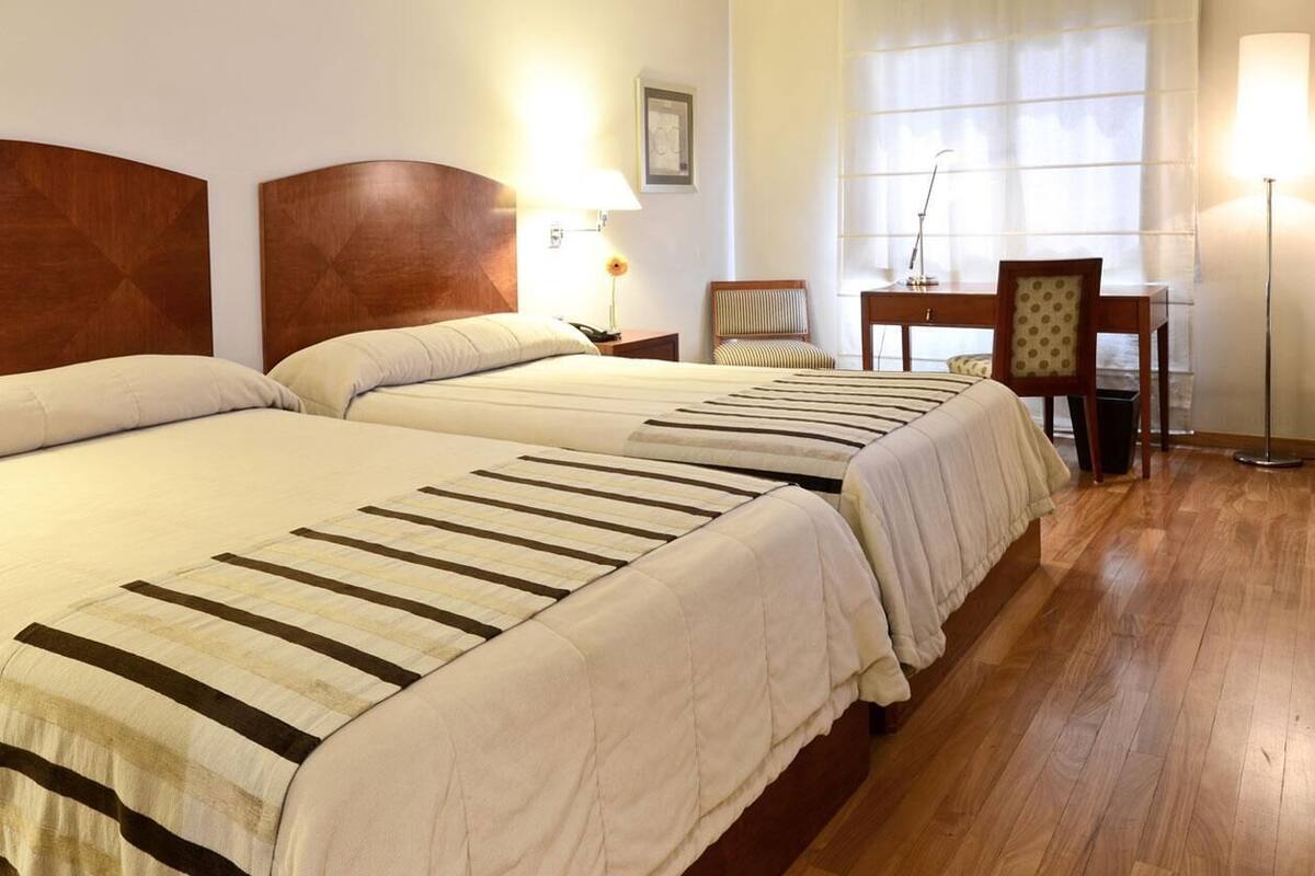 Ropa de cama de alta calidad, edredón y minibar