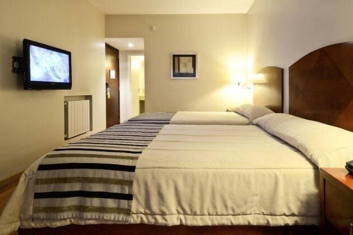 Ropa de cama de alta calidad, edredón y minibar
