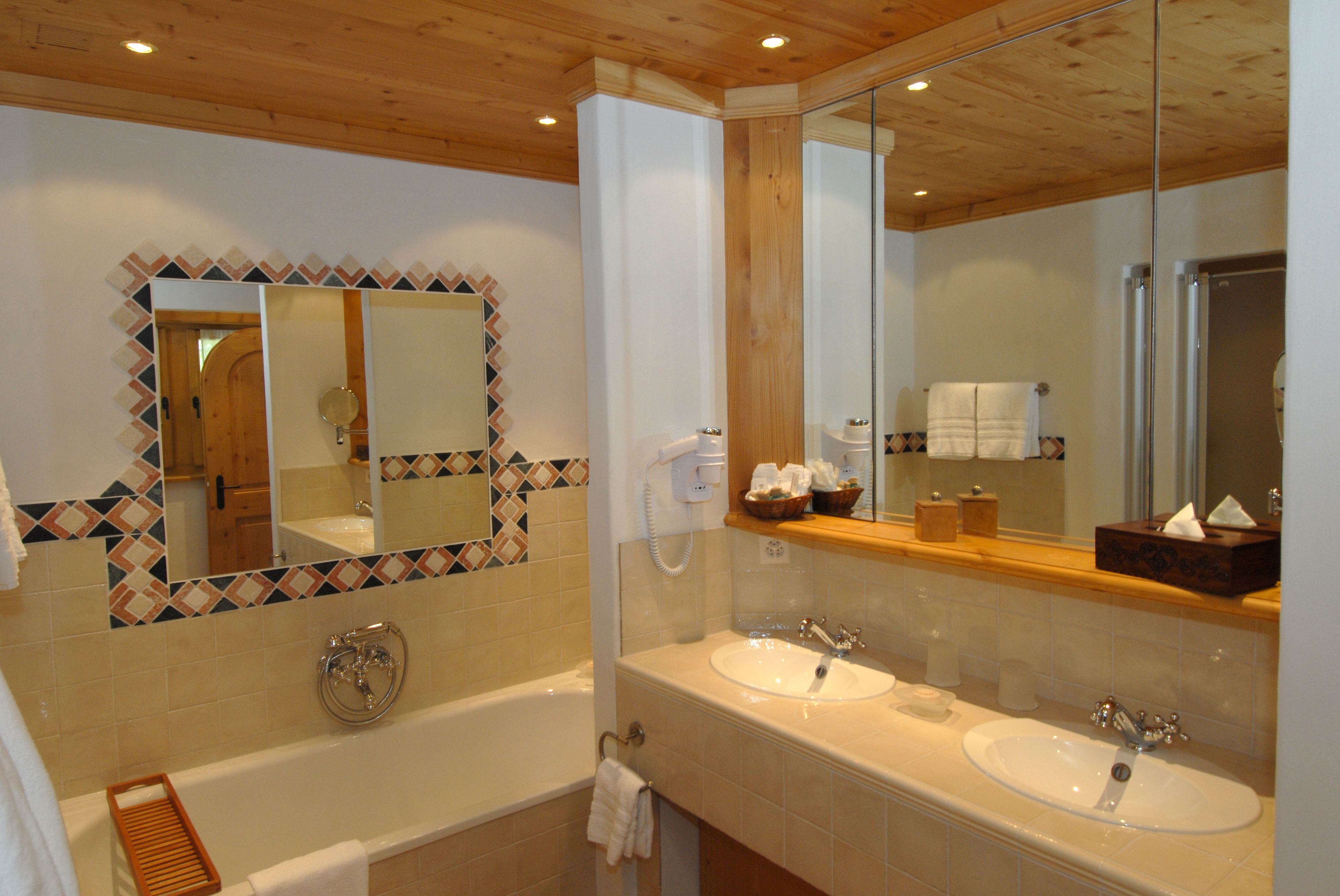 suite, balcony, mountain view (south view) | bathroom | separate bathtub and shower, designer toiletries, hair dryer, bathrobes