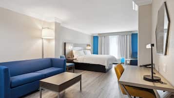 Suite, 1 King Bed | Pillowtop beds, in-room safe, desk, laptop workspace