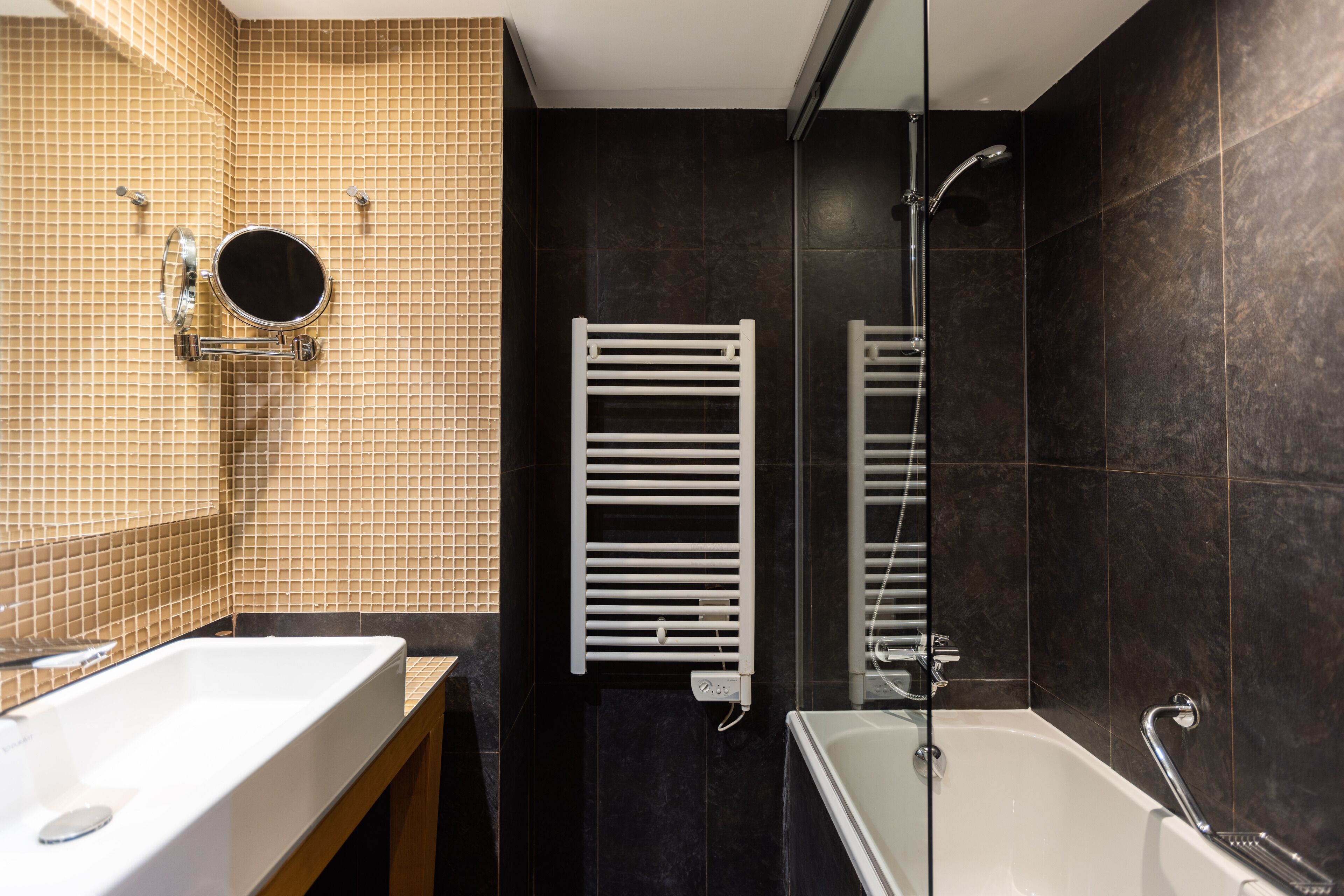 designer toiletries, hair dryer, bathrobes, towels