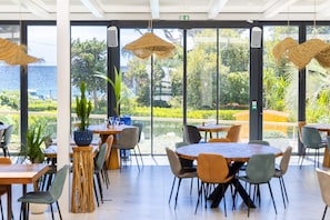 Breakfast, lunch, dinner served; Mediterranean cuisine, pool views