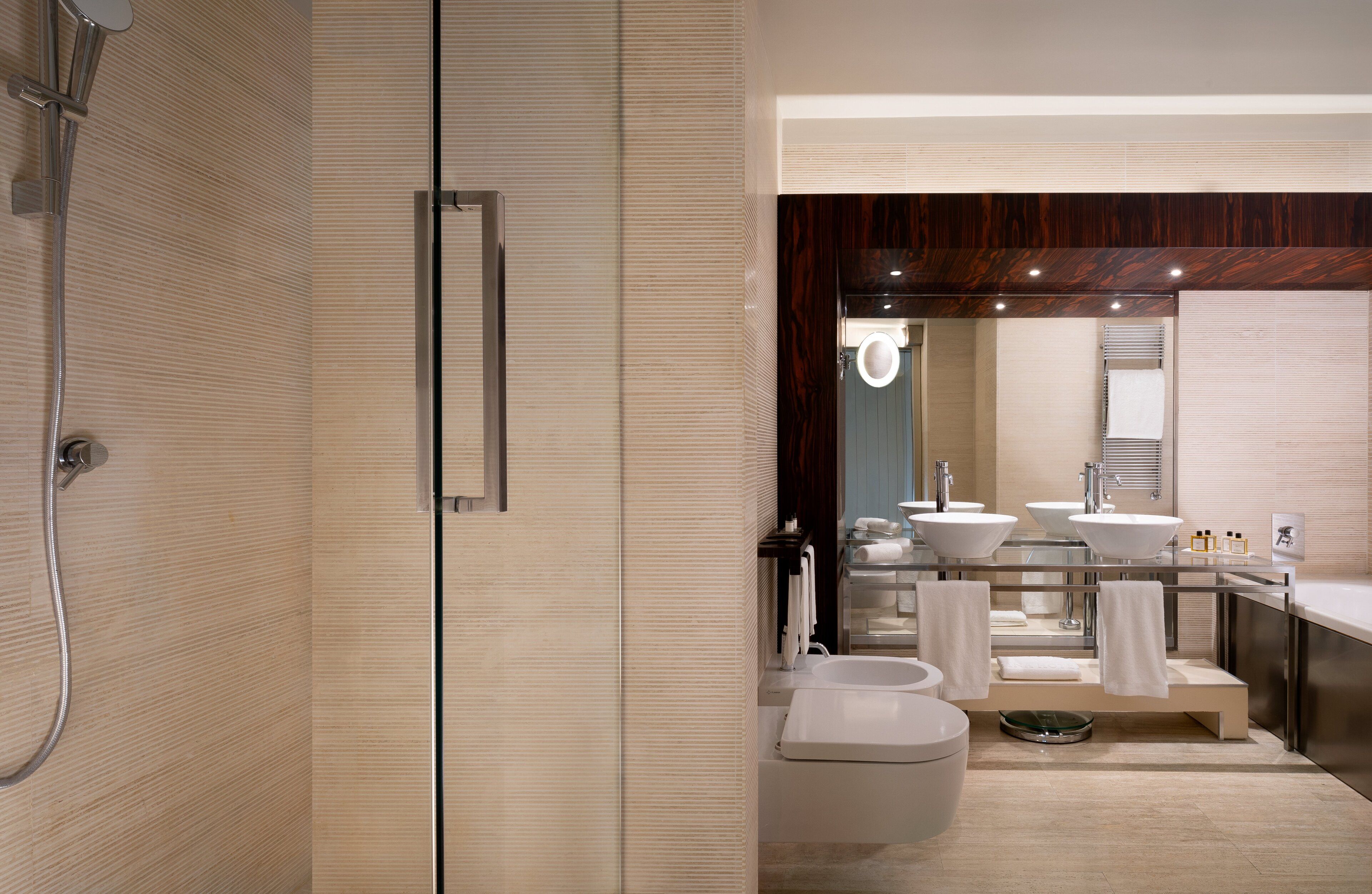 junior suite | bathroom | combined shower/bathtub, jetted bath, free toiletries, hair dryer