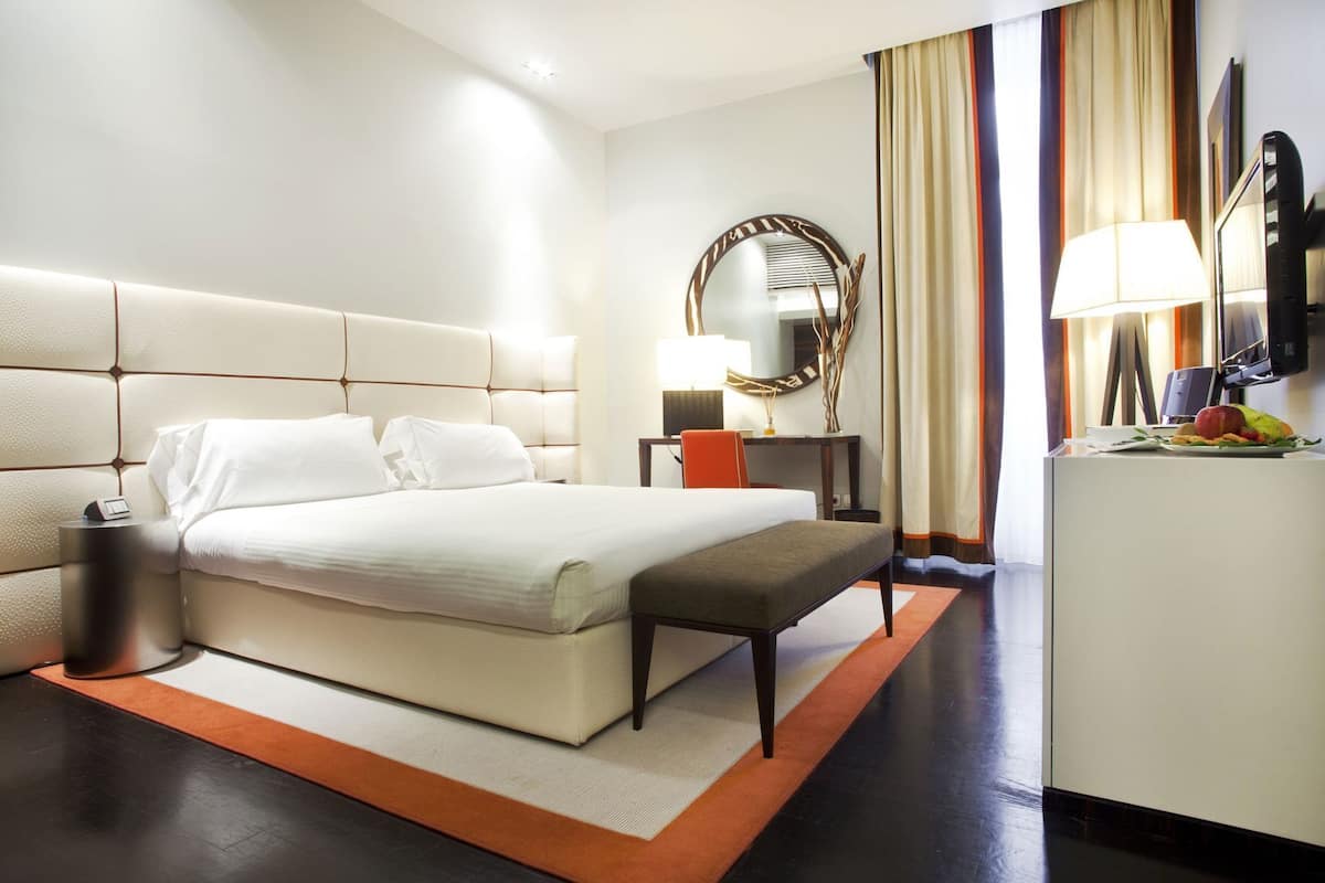 Premium bedding, minibar, in-room safe, desk