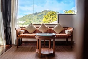 Premier Suite | Living area | 40-inch LED TV with cable channels, ping pong, toys - Orchidacea Resort (Karon)