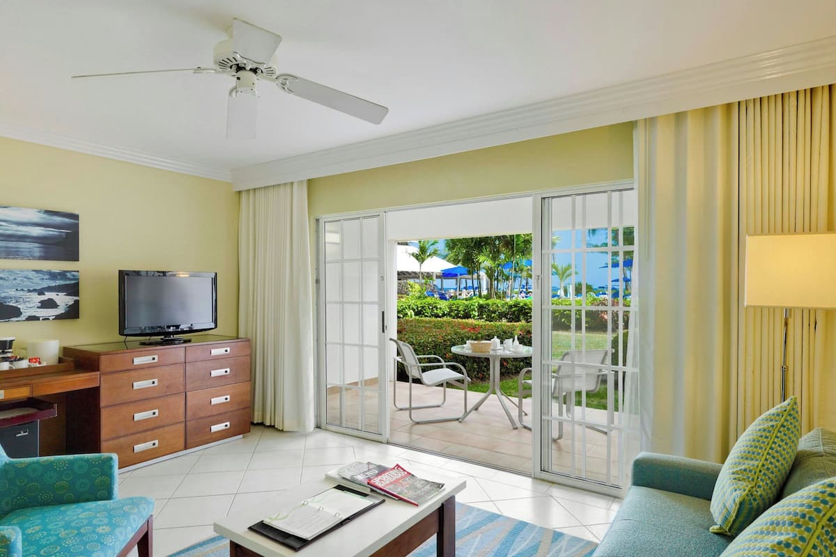 Garden View, Junior Suite | In-room safe, desk, blackout drapes, iron/ironing board