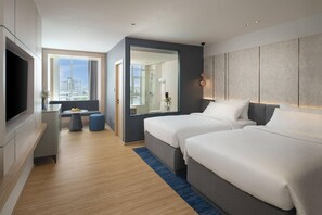 Deluxe Twin Room, 2 Single Beds | Minibar, in-room safe, desk, blackout curtains - Miracle Grand Convention Hotel (Bangkok)