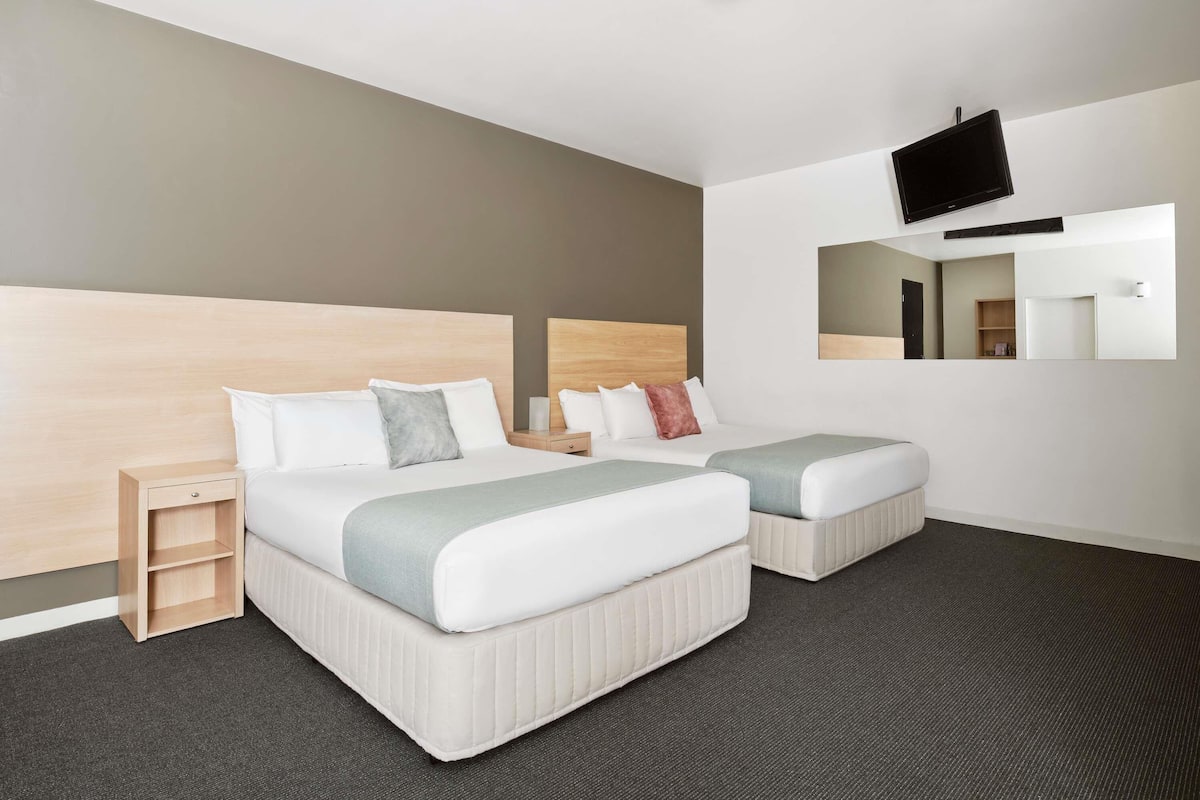 Family Room, 2 Double Beds | Down comforters, minibar, in-room safe, desk