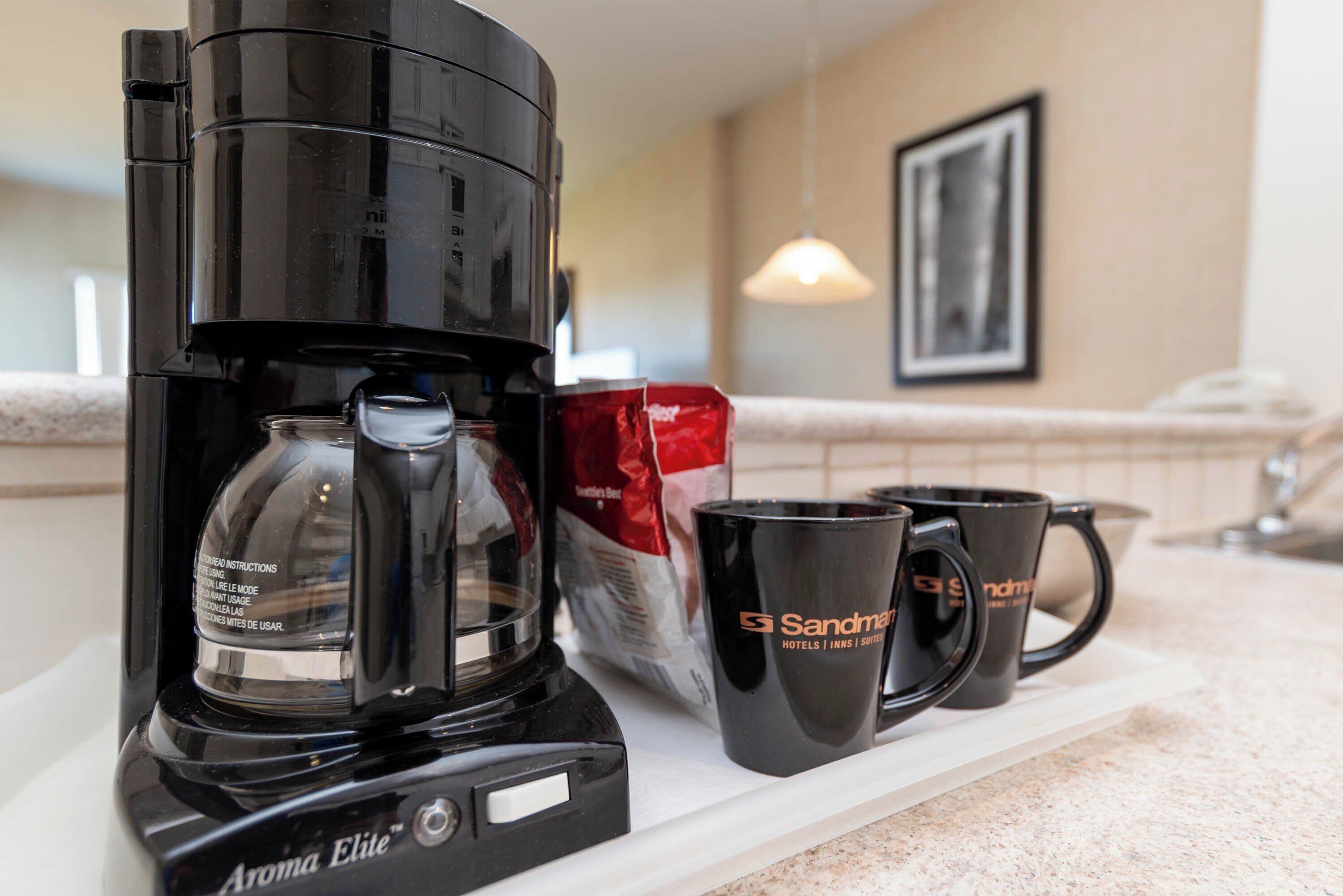 penthouse suite, 1 king, sofa bed, kitchen, top floor | coffee and/or coffee maker