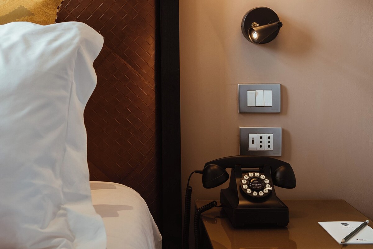 Suite, 1 très grand lit, vue jardin | Équipements de la chambre