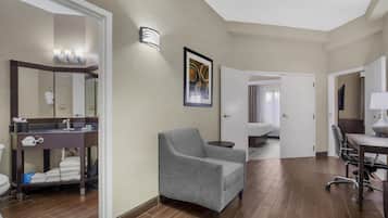 Desk, blackout drapes, iron/ironing board, free rollaway beds