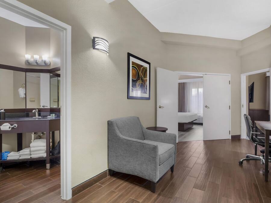 Desk, blackout drapes, iron/ironing board, free rollaway beds