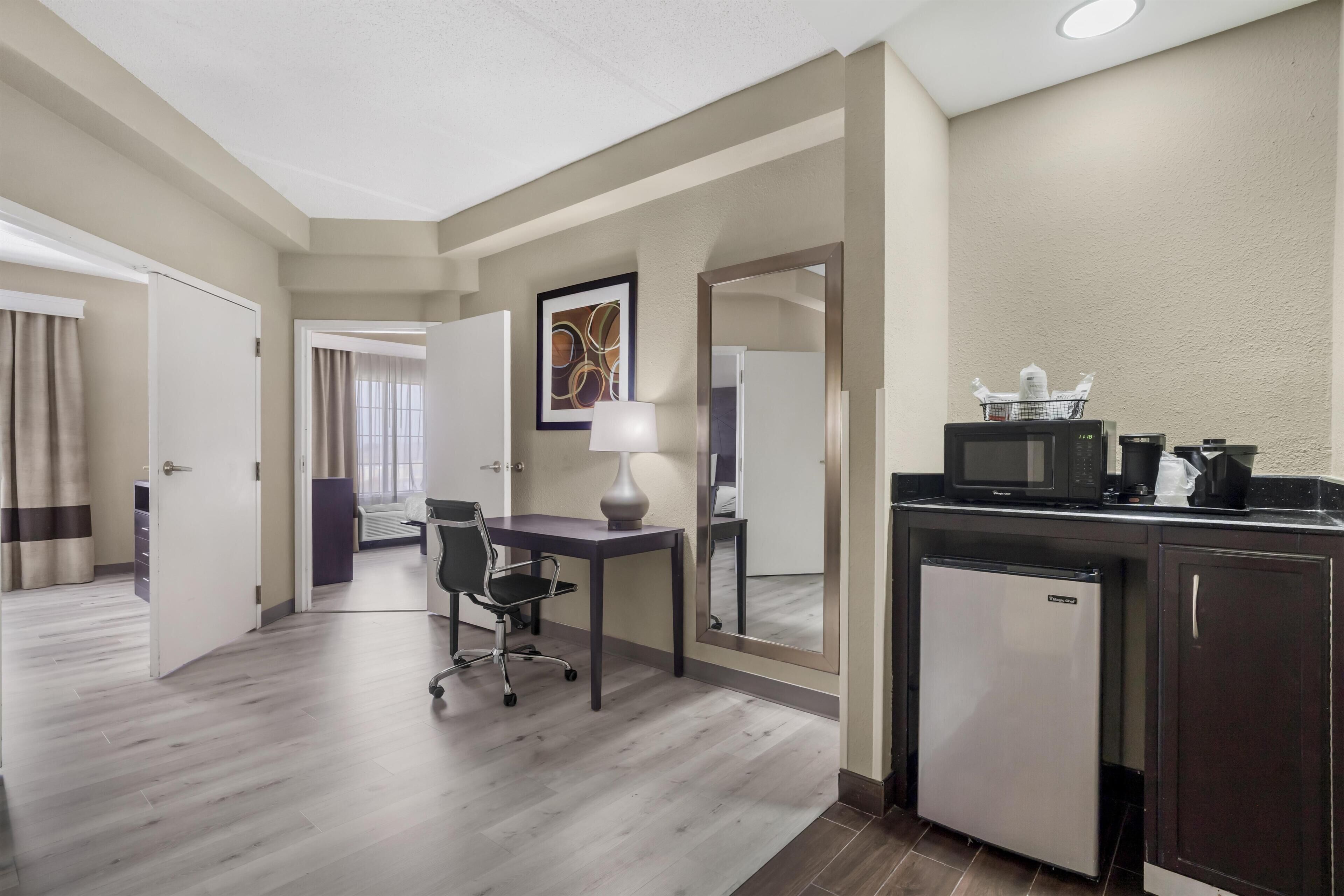 Desk, blackout curtains, iron/ironing board, free rollaway beds