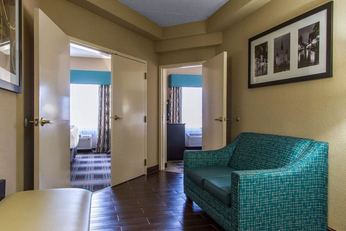 desk, blackout curtains, iron/ironing board, free rollaway beds