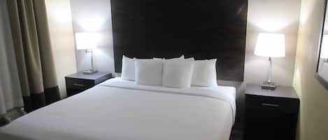 Suite, 1 King Bed, Non Smoking | Desk, blackout drapes, iron/ironing board, free rollaway beds