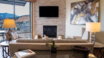 Suite, 1 King Bed (Lodge Master) | Living area | 42-inch flat-screen TV with cable channels, pay movies