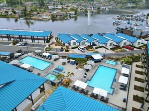 2 outdoor pools, open 9:00 AM to 9:00 PM, pool umbrellas, sun loungers