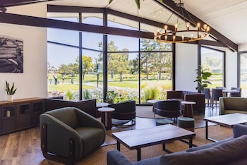 Breakfast, lunch, dinner served; golf course views at Lakehouse Resort