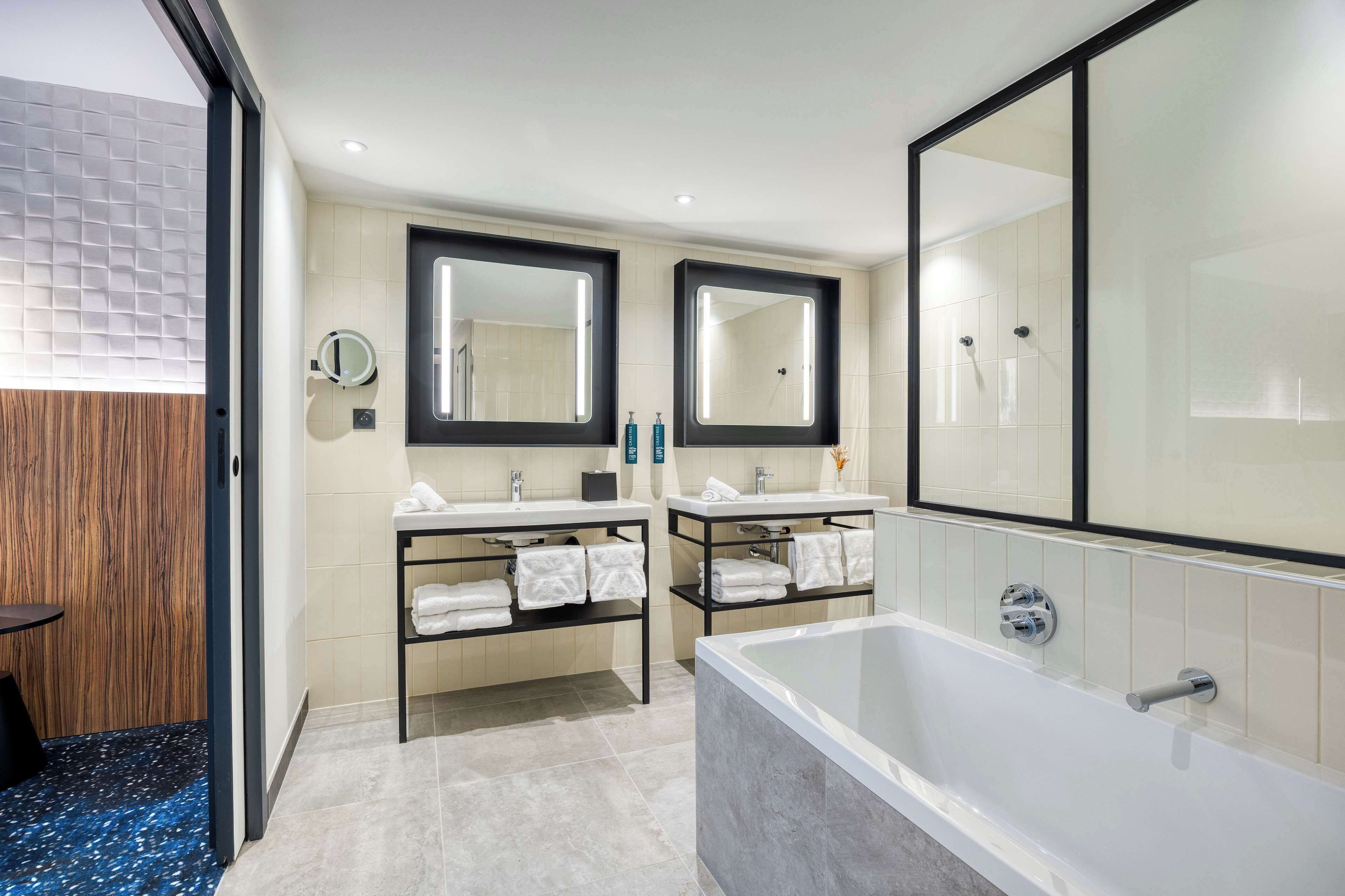 junior suite, 1 king bed | bathroom | shower, hair dryer, bathrobes, towels