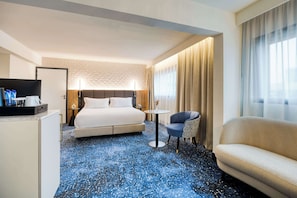 Room, 1 King Bed | Living area | 15-inch LCD TV with satellite channels, TV, pay films