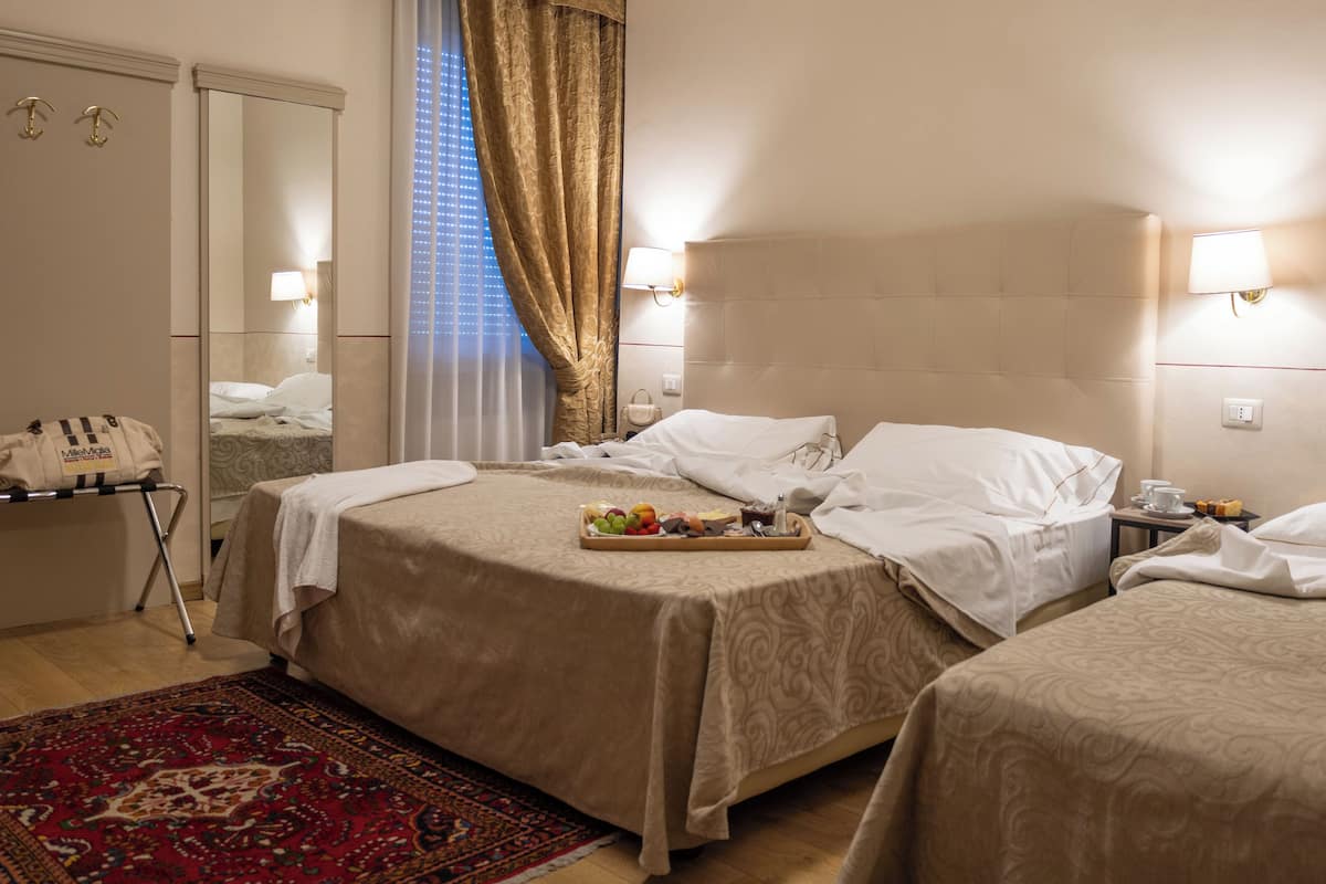 Hypo-allergenic bedding, minibar, in-room safe, desk