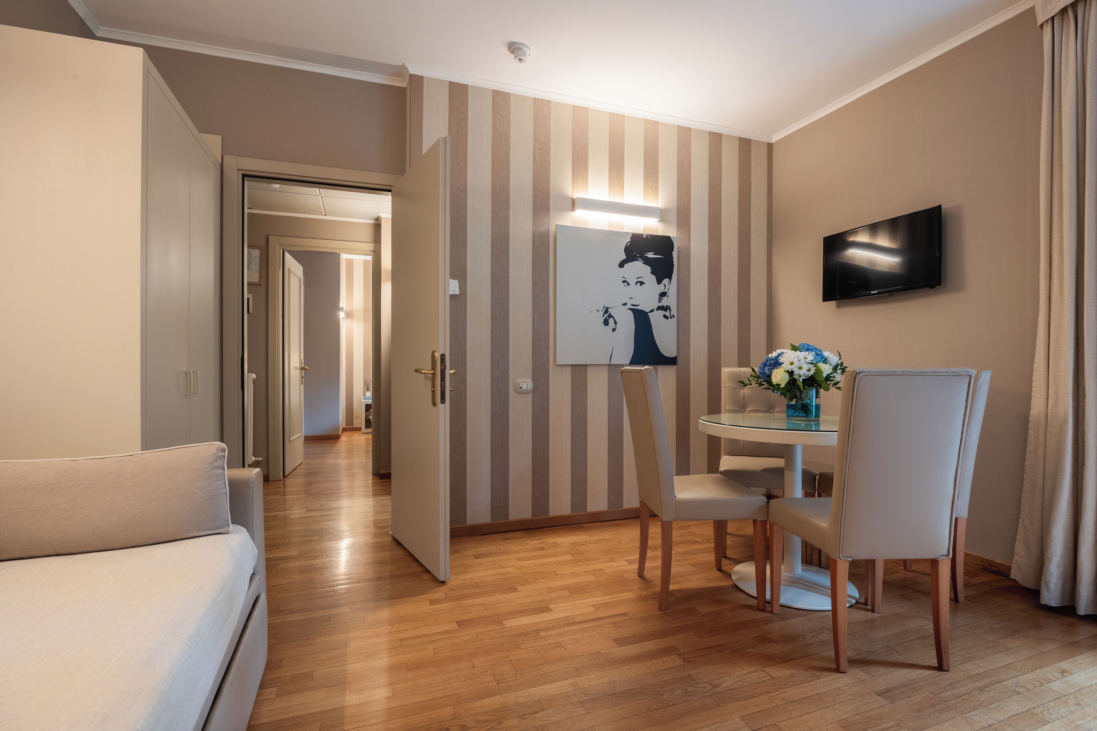 suite, garden area | living area | 28-inch lcd tv with satellite channels, tv