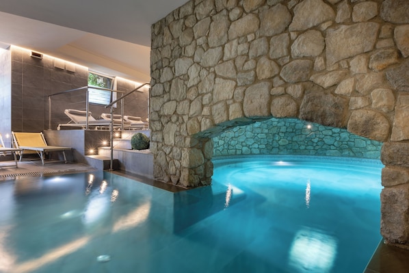 Indoor pool, seasonal outdoor pool, pool umbrellas, pool loungers