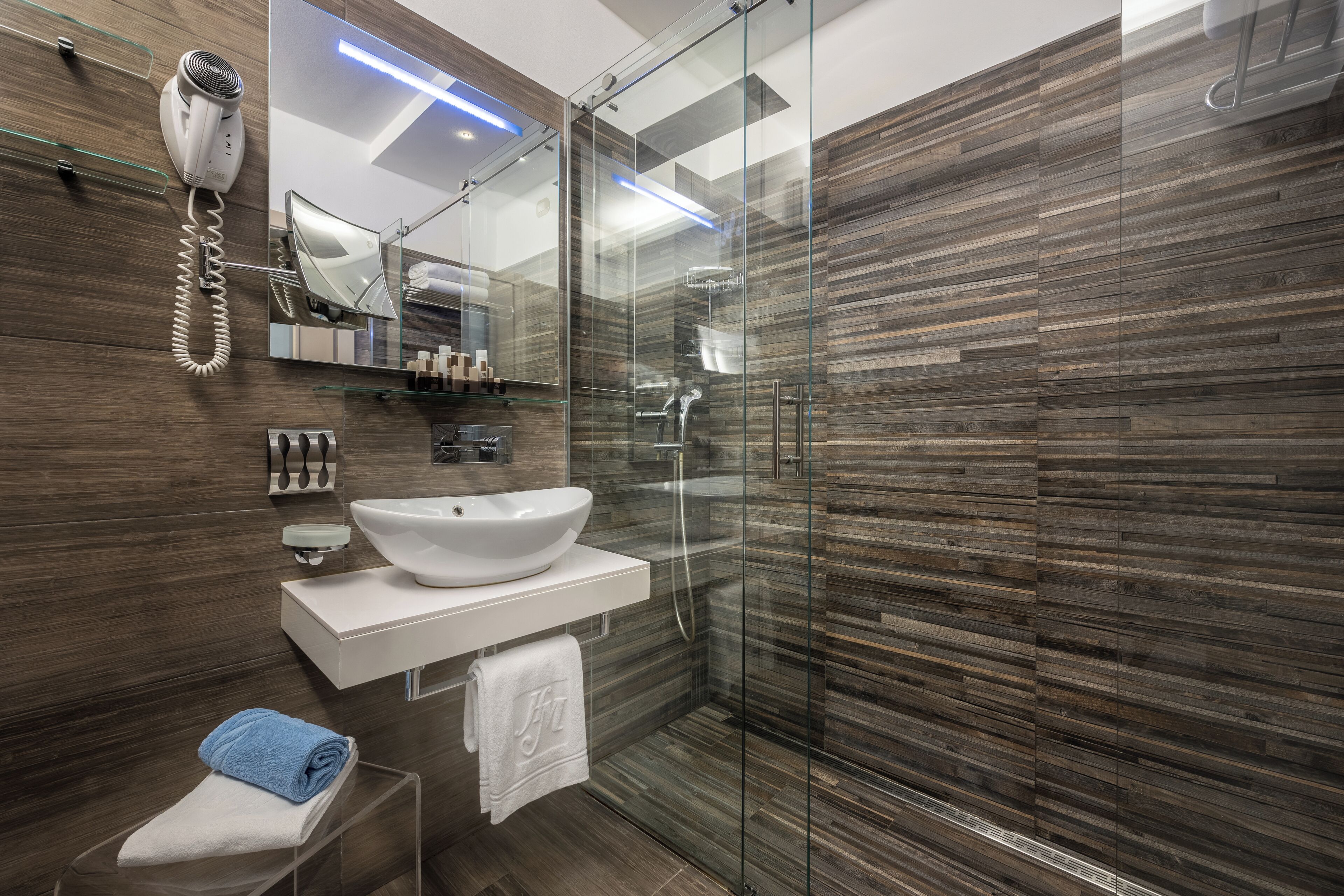 free toiletries, hair dryer, slippers, bidet