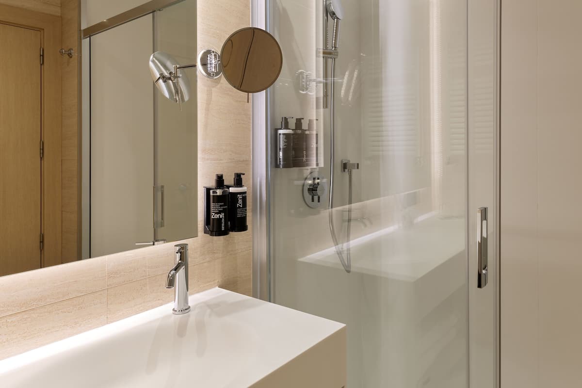 eco-friendly toiletries, hair dryer, bidet, towels