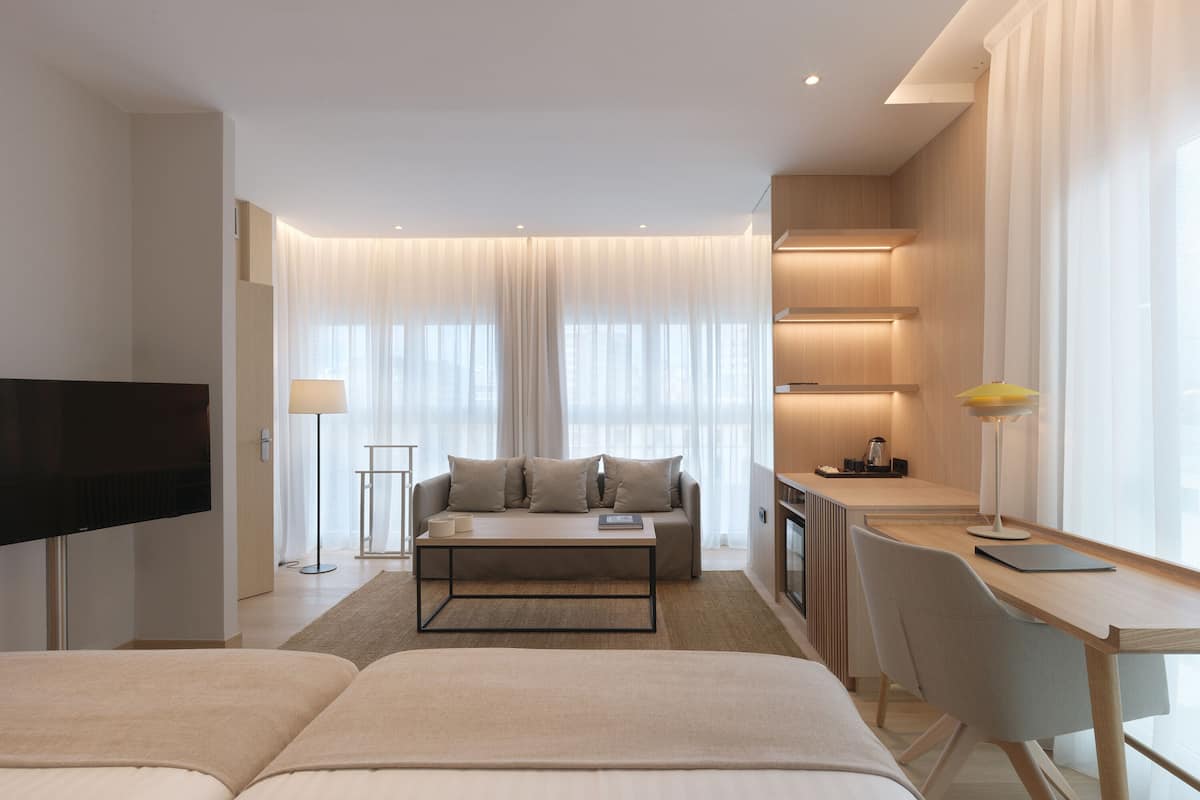 junior twin room | minibar, in-room safe, desk, laptop workspace