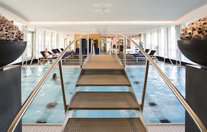 Indoor pool, open 7:00 AM to 10:00 PM, sun loungers