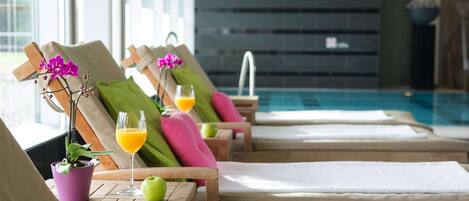 Indoor pool, open 7:00 AM to 10:00 PM, pool loungers