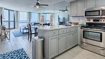 Condo, 1 Bedroom (Deluxe) | Private kitchen | Full-size fridge, microwave, oven, coffee/tea maker
