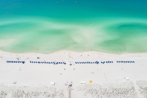 On the beach, sun loungers, beach umbrellas, beach massages