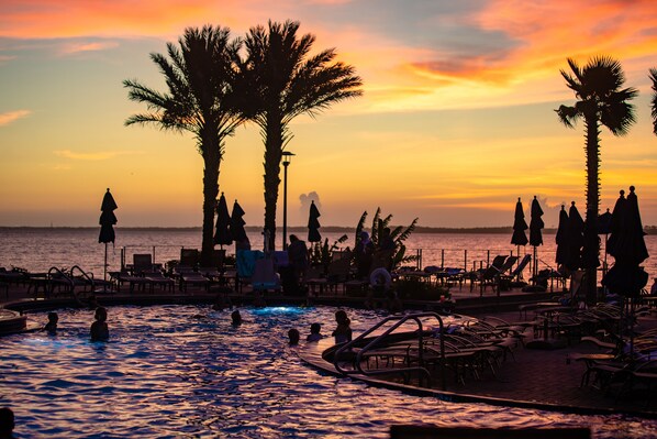 Indoor pool, pool umbrellas, pool loungers