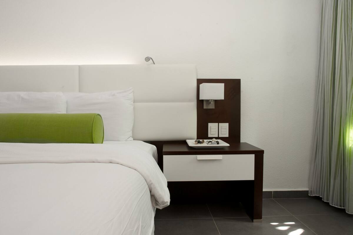superior room, kitchenette (room opens to garden) | in-room safe, iron/ironing board, cots/infant beds, free wifi