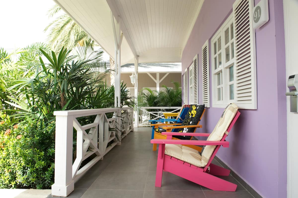 superior room, kitchenette (room opens to garden) | view from room