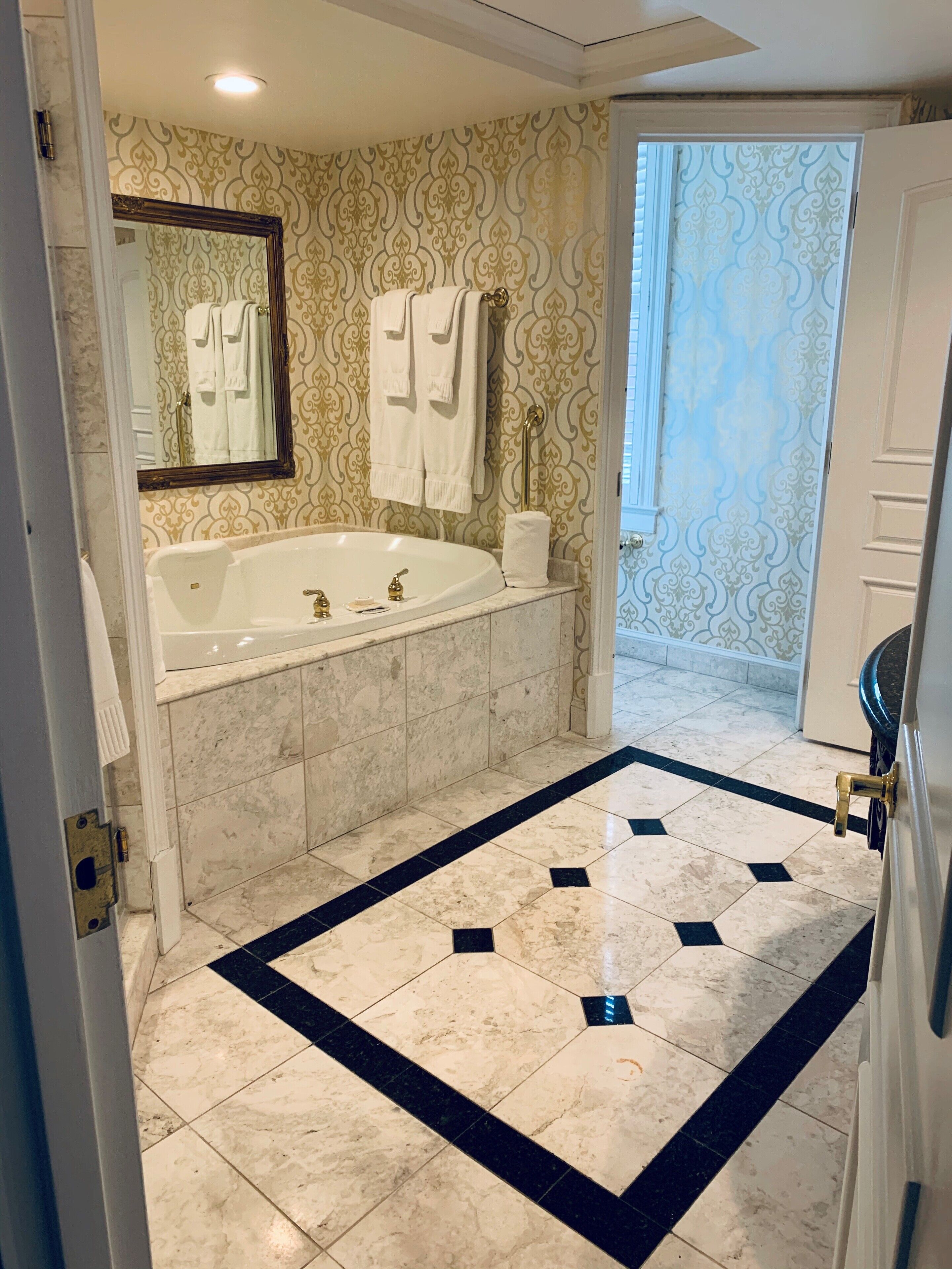 designer toiletries, hair dryer, bathrobes, slippers