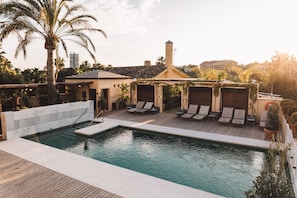 Outdoor pool, pool umbrellas, pool loungers