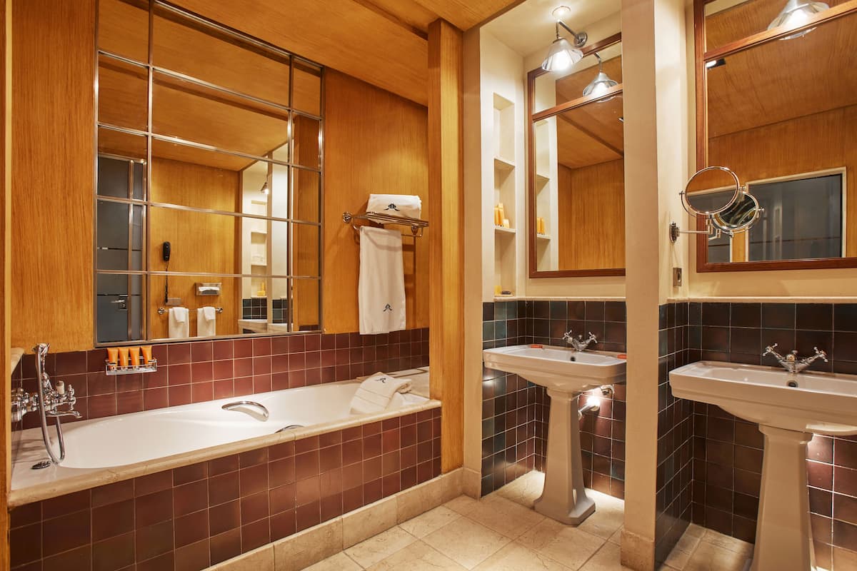 rainfall showerhead, designer toiletries, hair dryer, bathrobes