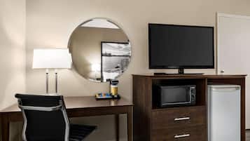 Desk, laptop workspace, blackout drapes, iron/ironing board