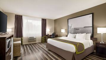 Desk, laptop workspace, blackout drapes, iron/ironing board