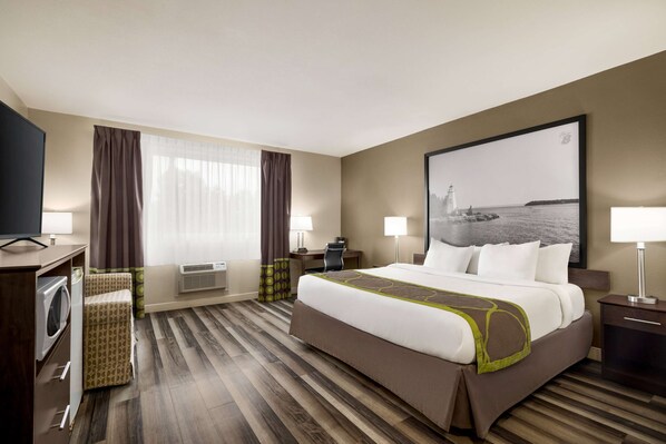 Habitación, 1 cama King size, para no fumadores | Escritorio, espacio para trabajar con laptop y cortinas blackout 